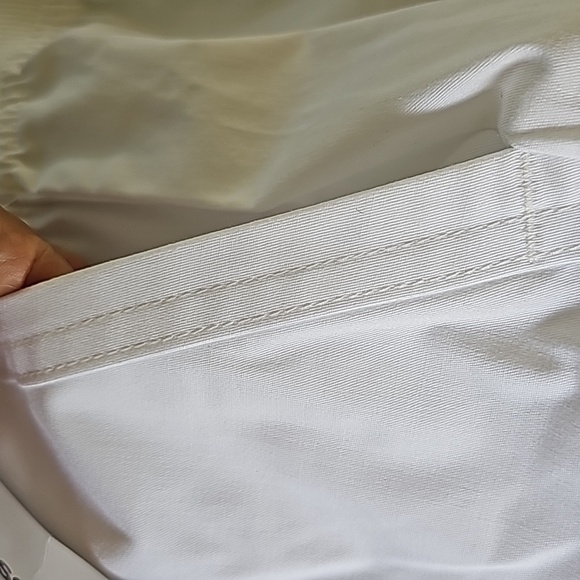 Scrubs, butter-soft. White with lots of pockets.  Cuff style. Size small… - Picture 8 of 8